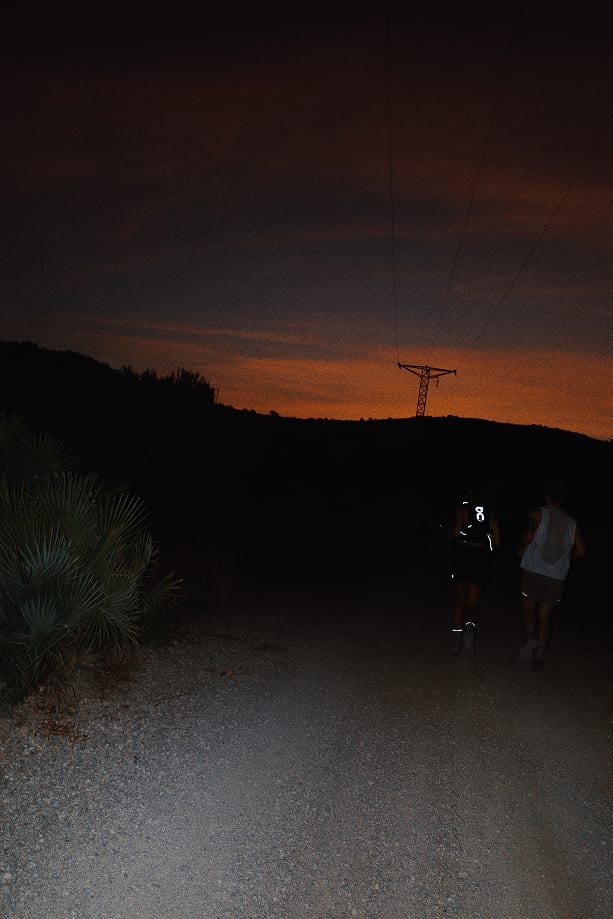Night trail run under a starburst light — 3CNL TSSP series